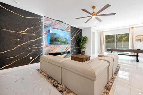 Large living room with pool table