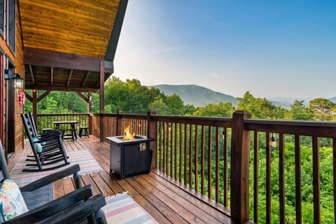Cozy up by the gas firepit and enjoy some of the most stunning mountain views 
