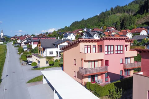 Main view of the building in summer
