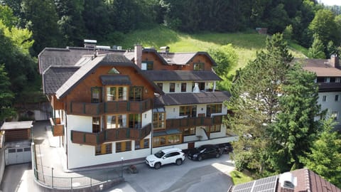 Main view of the building in summer