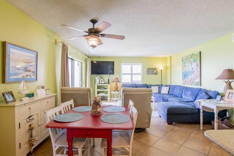 Bright and cozy living room with spacious seating and dining area