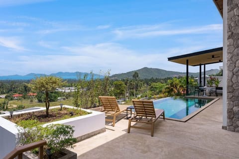 Stunning aerial view of Villa Ombra with private pool and lush tropical gardens in Mae Nam, Koh Samui