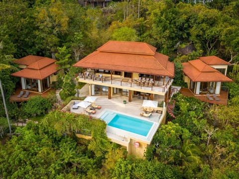 Private infinity pool with panoramic sea views and tropical gardens at Villa Soluna Koh Samui