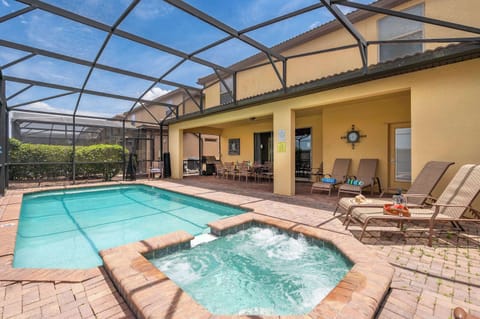 Sparkling screened-in pool perfect for sunny days & splashing around w/ the whole crew.
