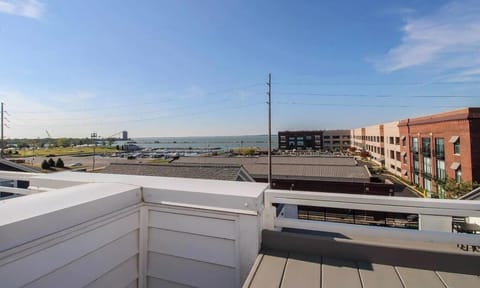 Take in sweeping views of Sandusky Bay and the marina from your private rooftop deck.