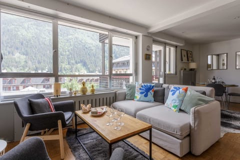 Spacious living area with large windows