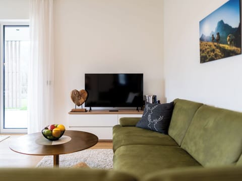 Furniture, Interior Design, Flooring, Couch, Floor, Wood, Living Room, Room, Table, Home