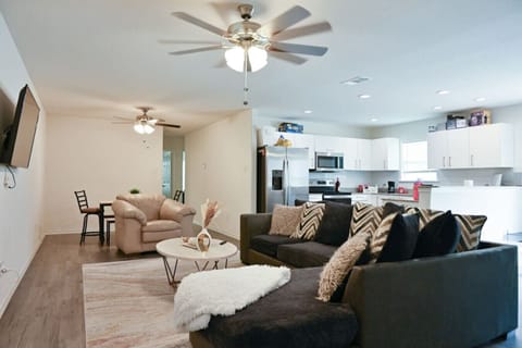 A bright and inviting living room designed for comfort and relaxation. Enjoy a cozy sofa, stylish décor, and plenty of natural light, perfect for unwinding after a long day or gathering with friends and family.