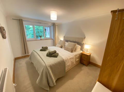 King size bed with luxury Egyptian cotton bed linens