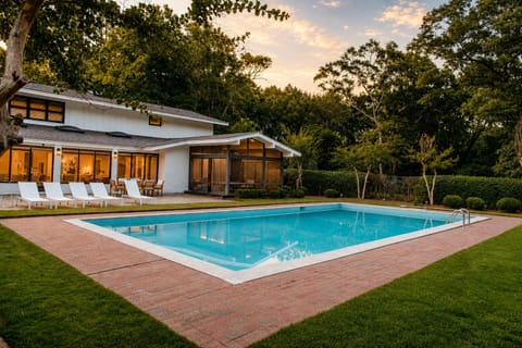 Pull up at dusk to a gated pool glowing across the estate, your whole crew already picturing the days ahead here together.