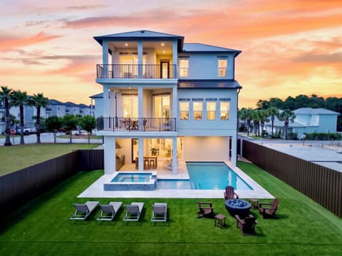 Tony by the Sea—a stunning 3-story luxury retreat in Miramar Beach. Enjoy a private pool & spa, spacious backyard with sun loungers and fire pit, multiple balconies, and a beautifully lit open-concept interior. The perfect getaway.