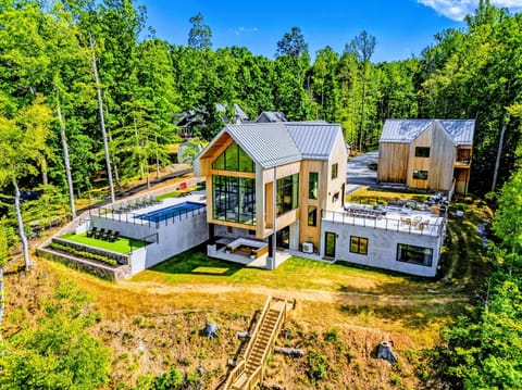Aerial View - The full estate from above, house and apartment among the pines.