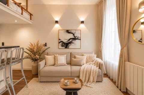 A warm and airy living room with sofa bed