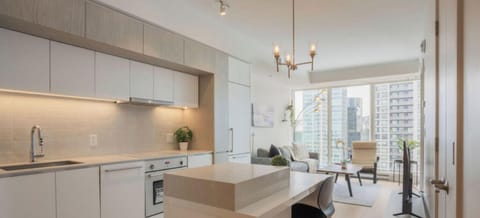 Explore this fully equipped kitchen, featuring streamlined design and ample prep space