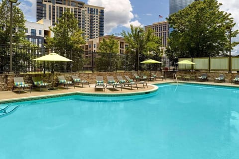 Float into a calm afternoon by the sparkling outdoor pool.