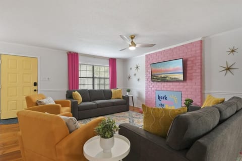 Sun-soaked vibes and pops of color—this is where cozy meets happy.