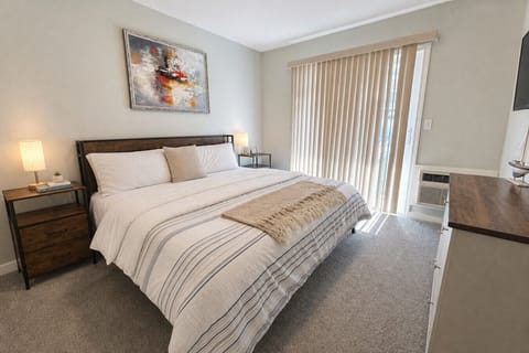 King bed with AC unit, walk right out, phone chargers hubs, noise machines, smart TV