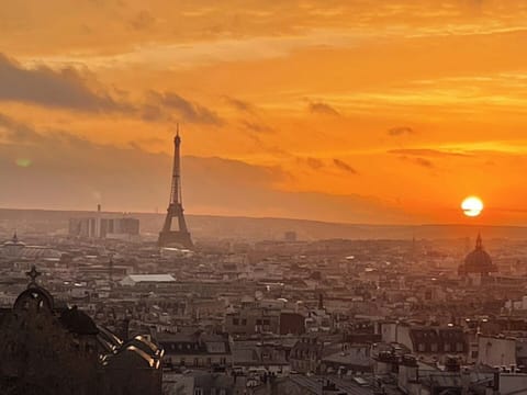 Spectacular Eiffel Tower sunset view from the apartment  One of the apartment's highlights: breathtaking sunset views over Paris and the Eiffel Tower.
