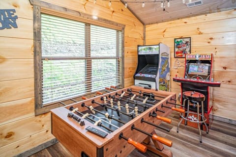 Game Room: Challenge friends with foosball and arcade classics in a fun-filled retreat!