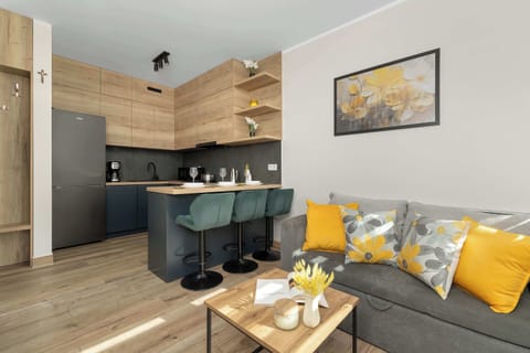 A welcoming living room with a sofa bed and coffee table. The stylish décor creates a comfortable place to relax.