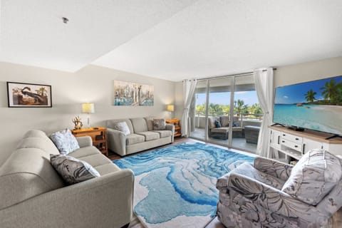 Oceanfront Living Room area with sleeper sofa, TV and balcony access