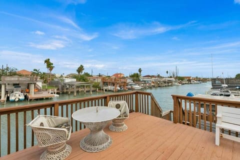 Enjoy spacious deck overlooking canal
