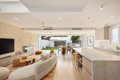 Indoor–outdoor living with luxe kitchen, sunny backyard and plunge pool