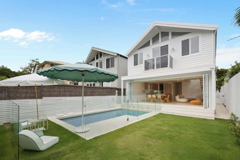 Modern coastal retreat with lap pool and seamless indoor–outdoor living