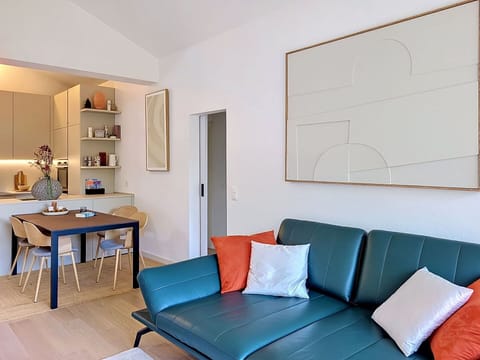 Furniture, Interior Design, Flooring, Wall, Wood, Floor, Couch, Table, Living Room, Lighting