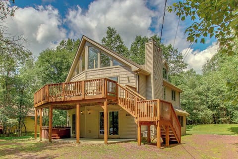 Welcome to your Poconos retreat, a charming A-frame chalet nestled among the trees
