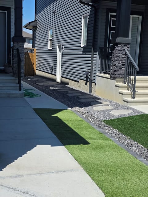 Sidewalk leading to the suite entrance. 