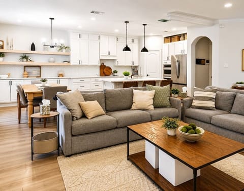 Bright open-concept living and kitchen in this updated Irving townhome — your home base just 5 minutes from DFW Airport.