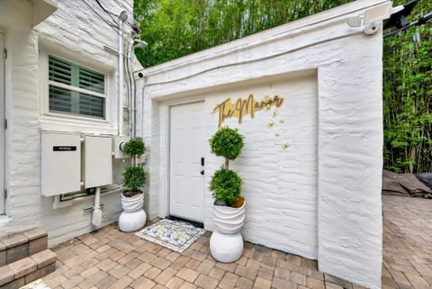 Private studio entrance with dedicated brick-paver walkway