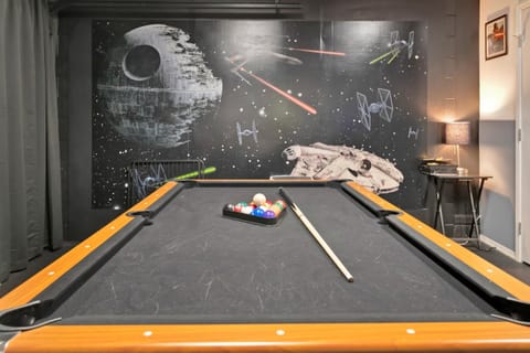 Star Wars game room with pool table for family fun