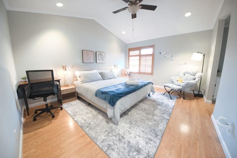 Serene king suite with desk, reading nook & natural light