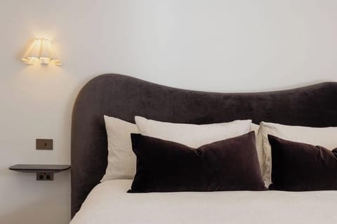 Layered textures and soft lighting for restful nights.