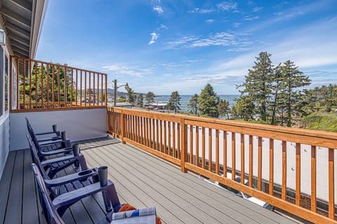 Relax on your private deck with sweeping ocean views, lined with comfortable seating where you can soak in coastal breezes and endless blue horizons.