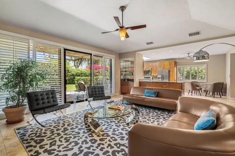 Living Room with flat screen tv & patio views