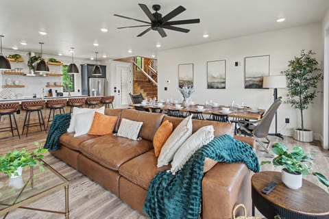 Bright, open-concept living space designed for gathering, relaxing, and making memories together. ✨
