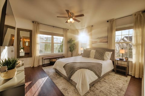 The second bedroom features a comfortable queen size platform bed, walk-in closet and a 50-inch Roku TV. A full size bathroom is just three steps away.
