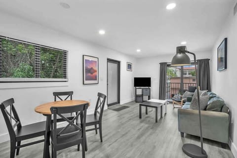 Open-concept layout with plenty of natural light, creating a welcoming space to relax, dine, and gather.