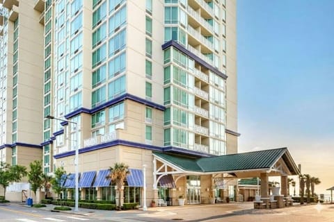 Arrive in style under a grand, resort-like covered entrance.
