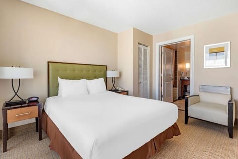 Settle into crisp linens and a calm, cozy sleeping space.