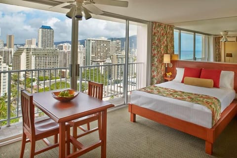 Drift off beside panoramic city lights and ocean blue.