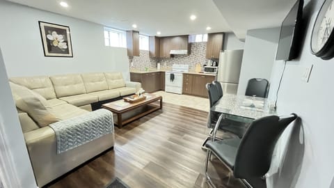 Spacious living room area featuring open concert kitchen and dining!
