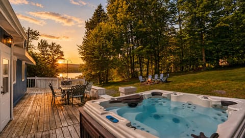 Soak and unwind. End your day relaxing in the outdoor hot tub with unbeatable views of the surrounding nature.