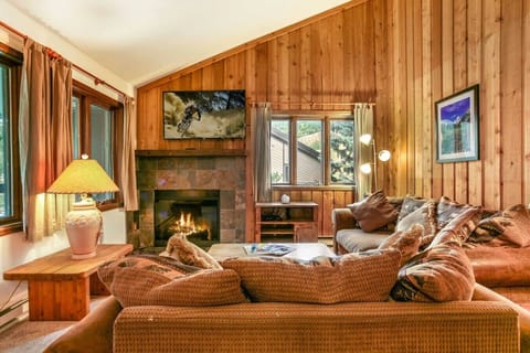 Living room with fireplace and smart tv