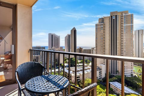 Step out onto your private balcony to enjoy breathtaking, elevated panoramic views of the city skyline.