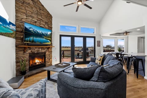 Living Room with Indoor Fireplace | Tons of natural light!