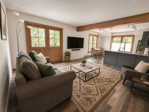 Open layout w/ views of gondola plaza and ski area